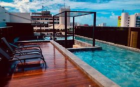 Apartamento Completo na praia com terraço privativo - 2 quartos